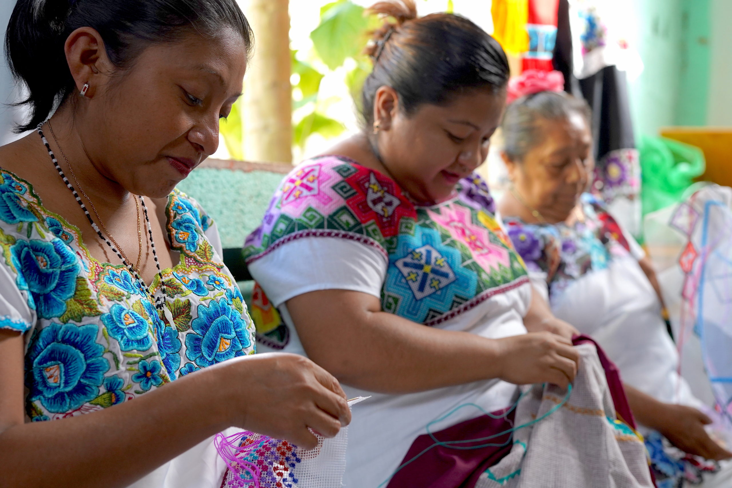 Maya seamstresses sewing traditional patterns